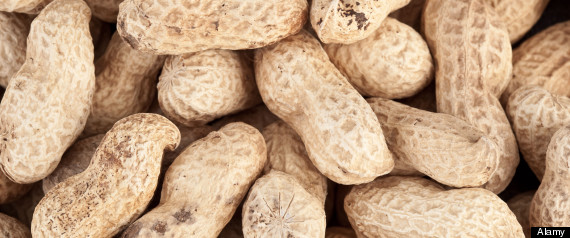 Background made of roasted peanuts in a pile Peanuts